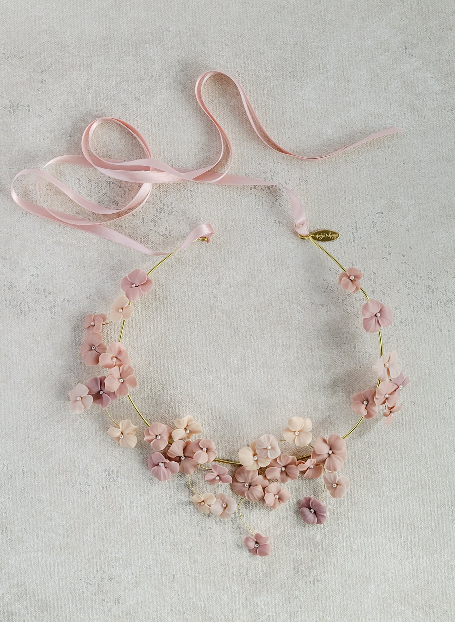 Hand sculpted clay flower bridal necklace in blush by Twigs & Honey.