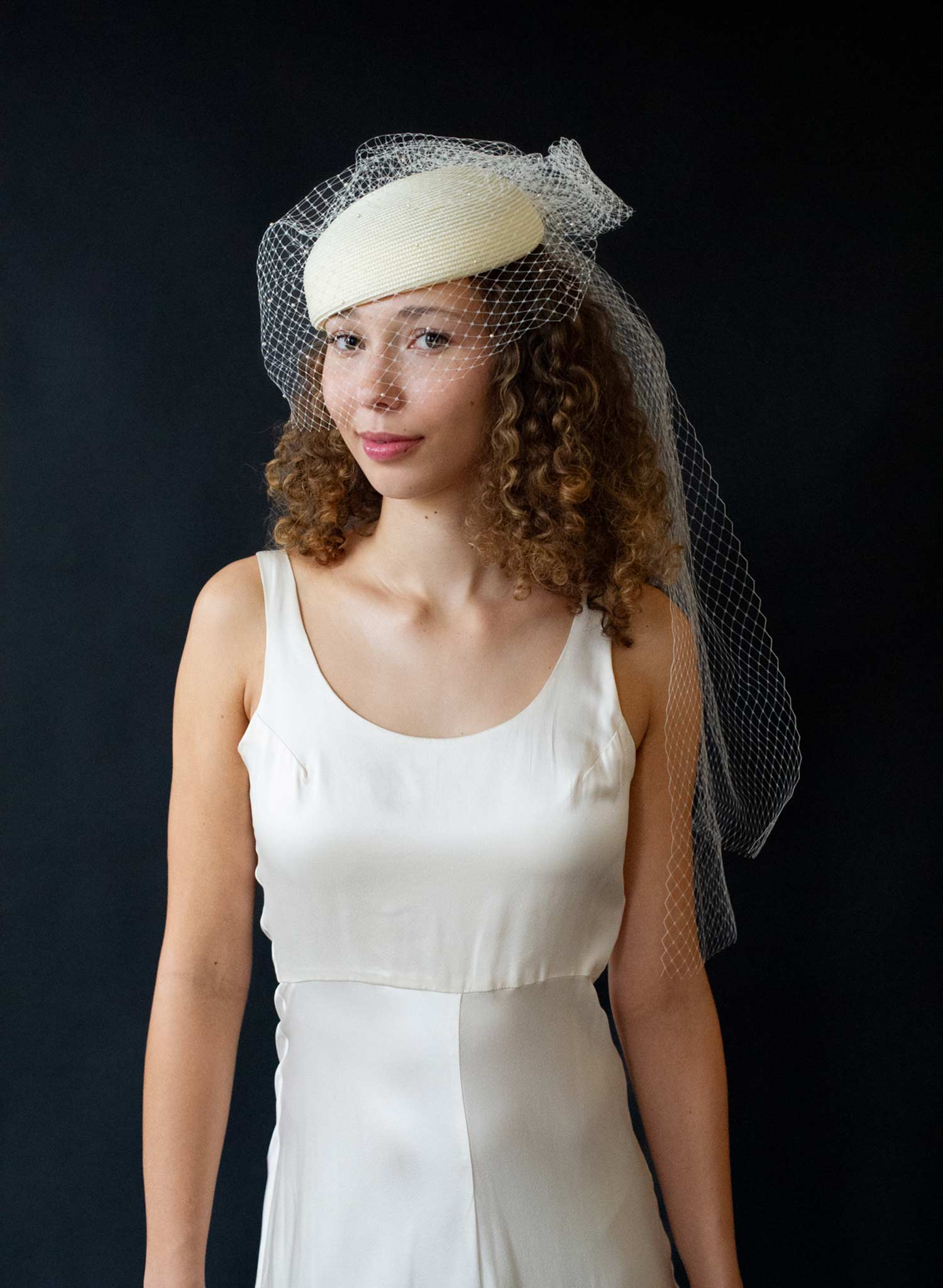 Straw pillbox bridal hat with birdcage veil - Style #2650