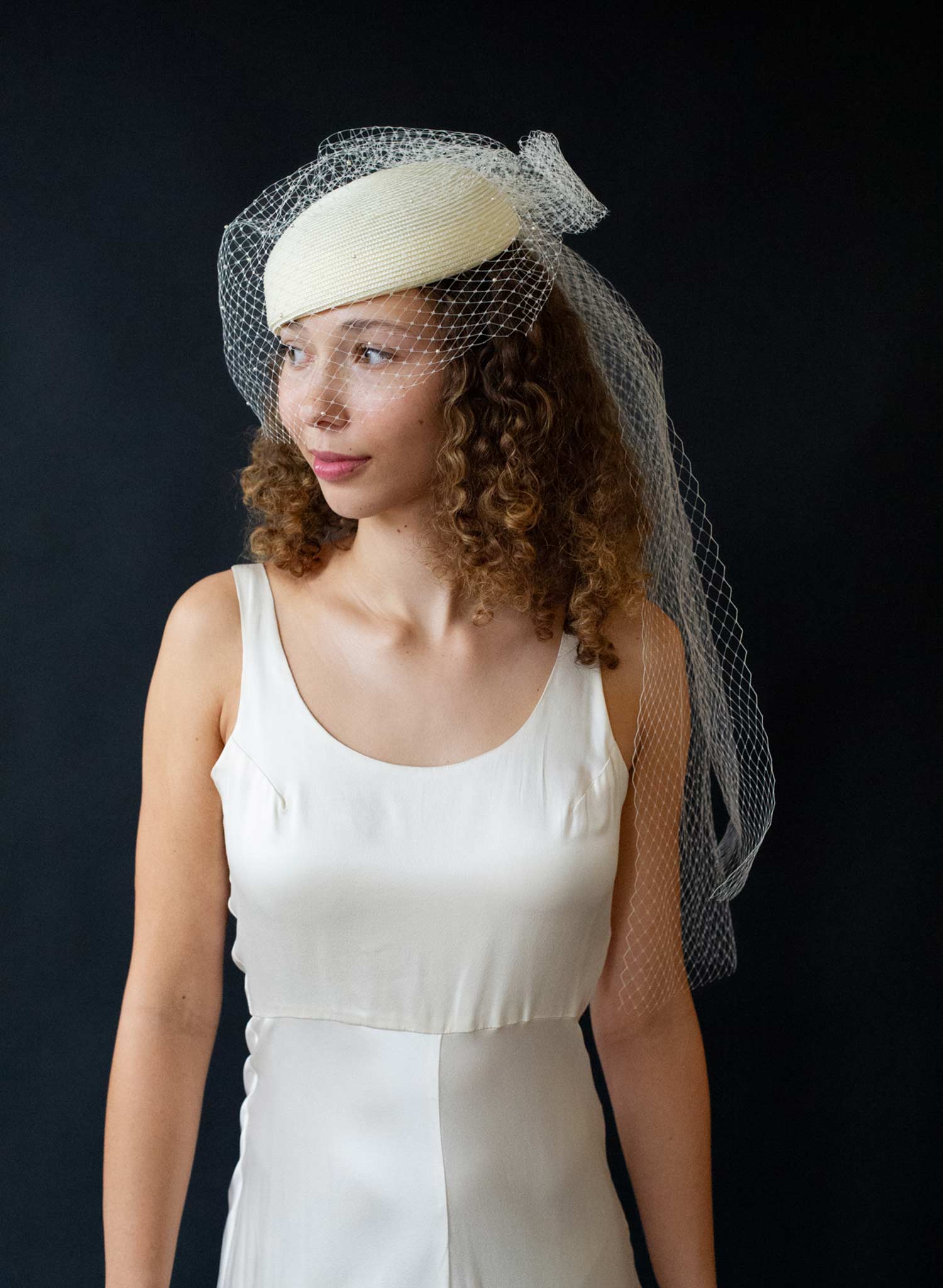 Straw pillbox bridal hat with birdcage veil - Style #2650
