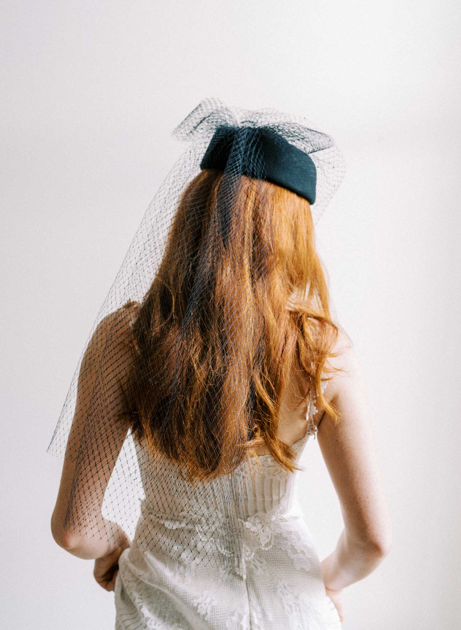 Bridal pillbox hat with pearl speckled veil - Style #2675