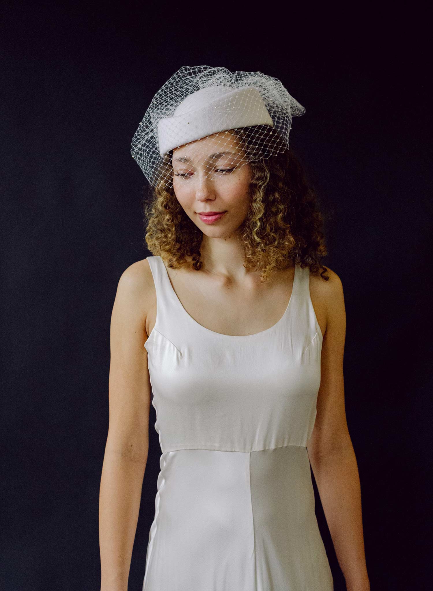 Bridal pillbox hat with pearl speckled veil - Style #2675