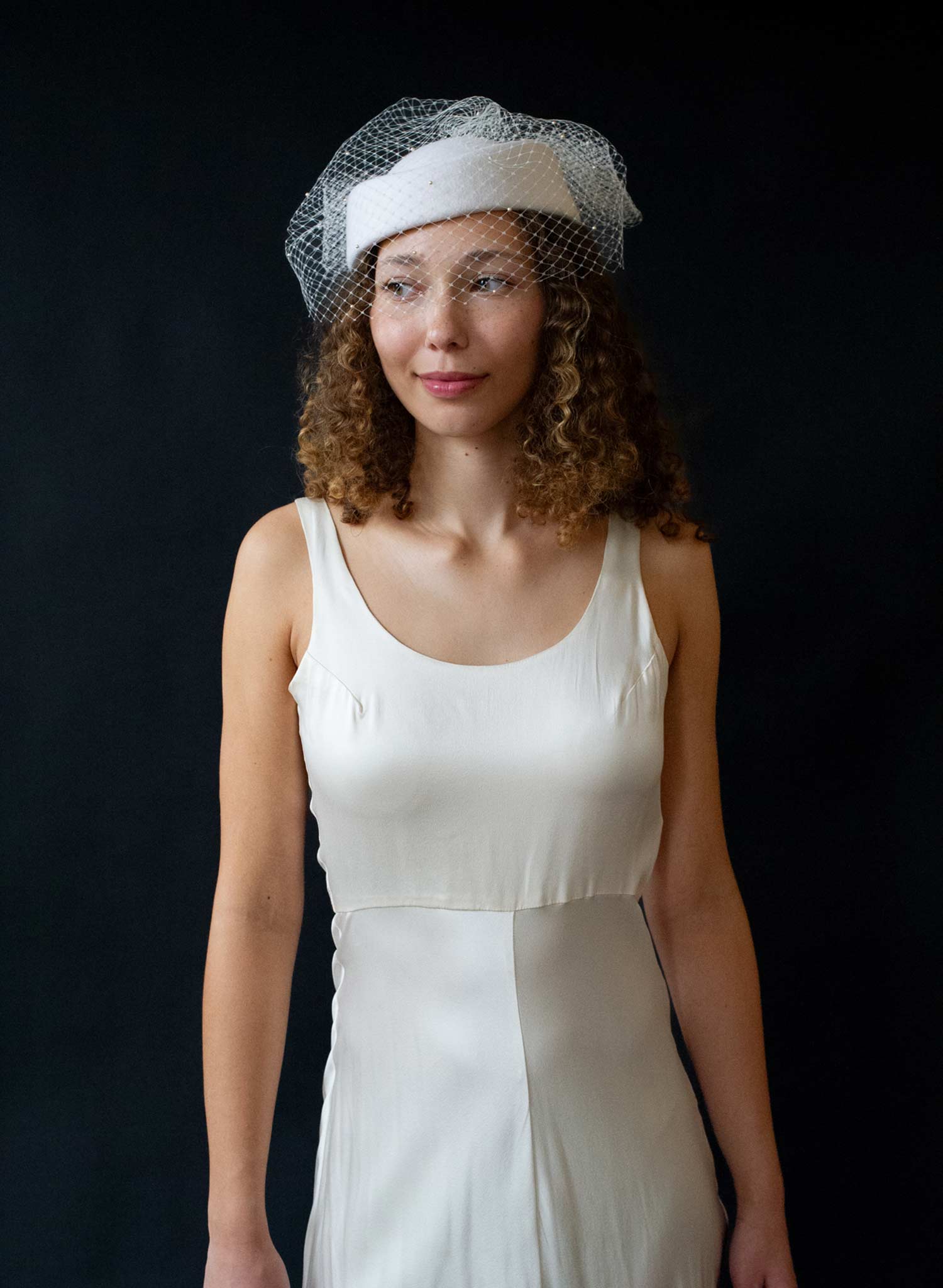 Bridal pillbox hat with pearl speckled veil - Style #2675