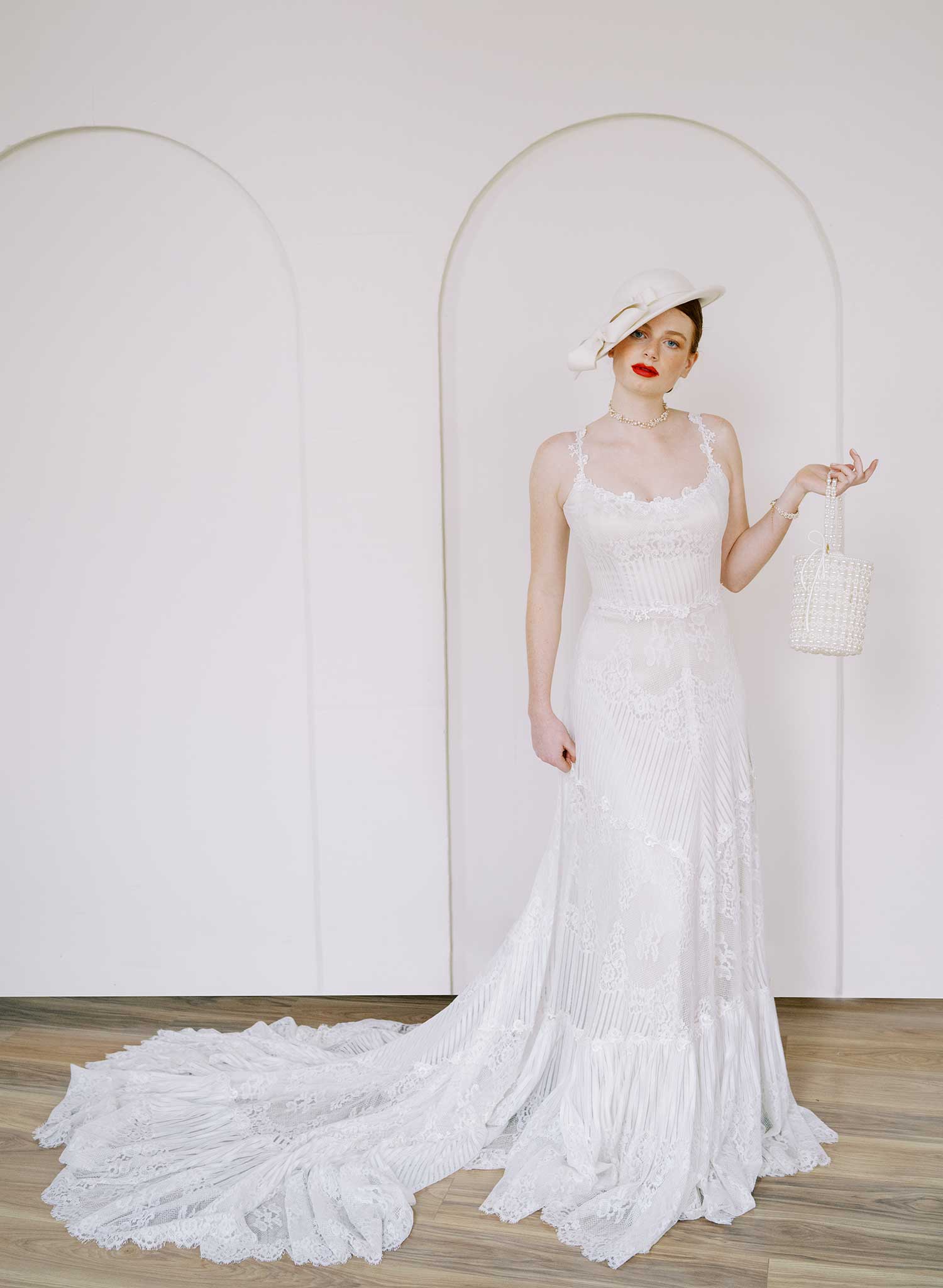 Bridal sloping wool hat with cascading bows - Style #2677