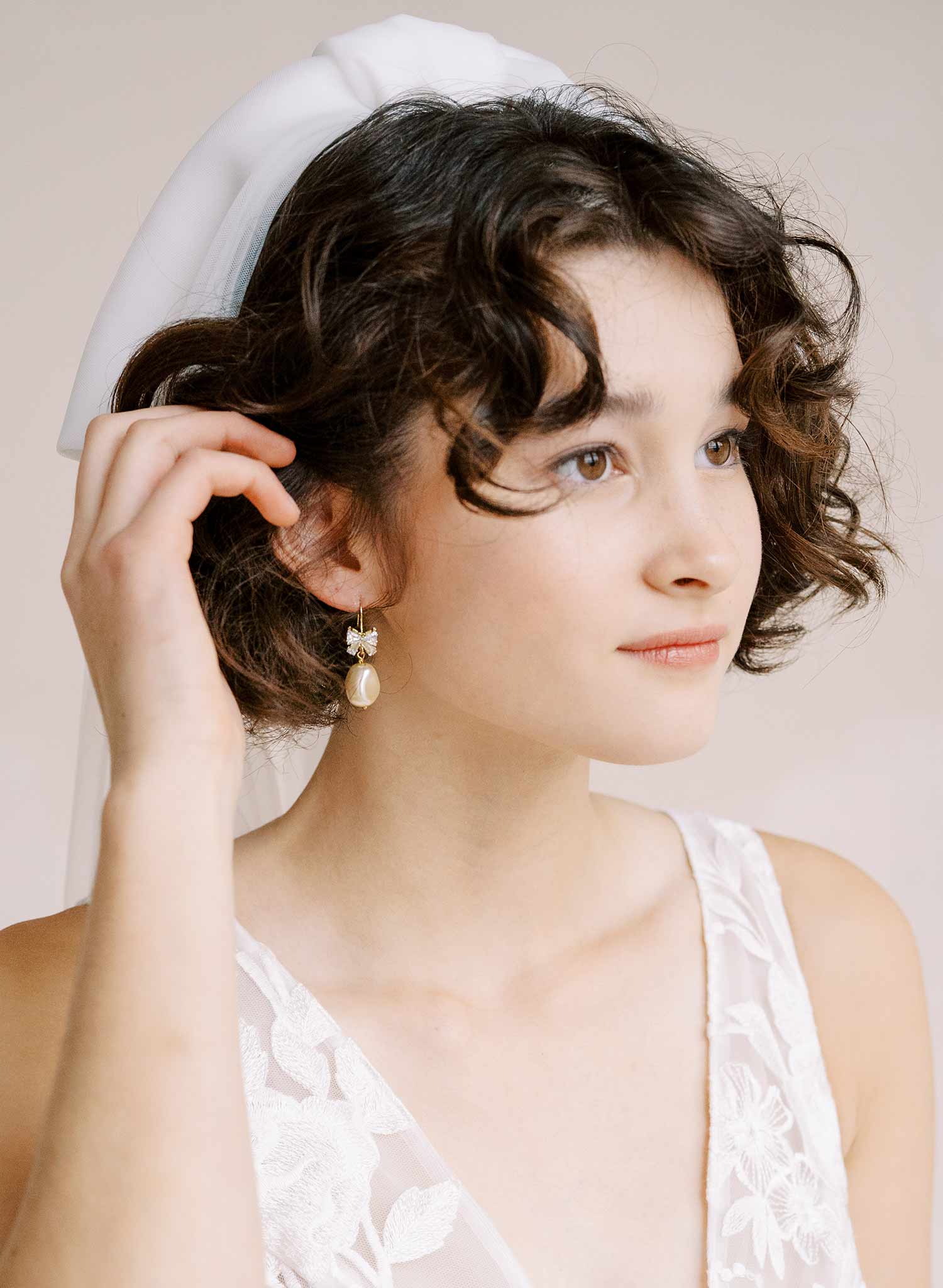 pearl and crystal bow bridal earrings by twigs and honey