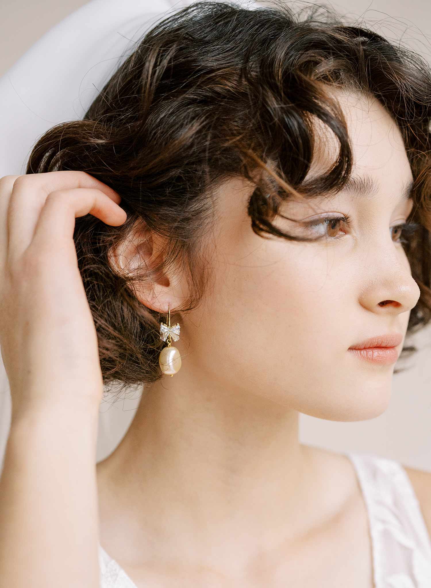 pearl and crystal bow bridal earrings by twigs and honey
