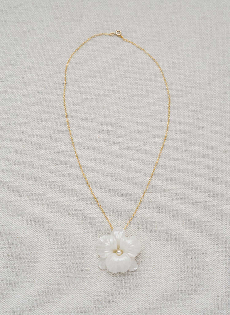 simple handmade white clay orchid flower pendand gold necklace, twigs and honey