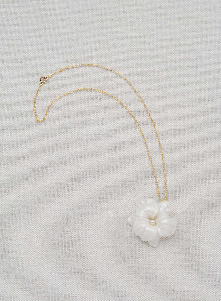 simple handmade white clay orchid flower pendand gold necklace, twigs and honey