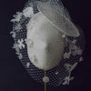 mini birdcage veil hat with pearls and silk flowers, twigs and honey