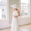 wide white straw hat with silk flowers and bow, twigs and honey