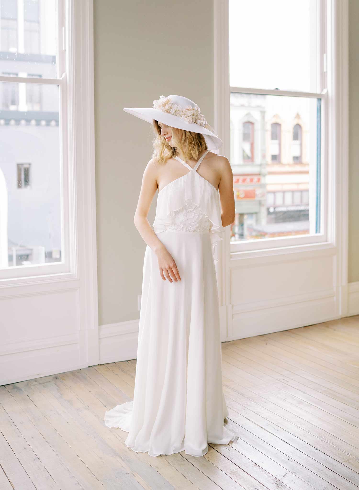 wide white straw hat with silk flowers and bow, twigs and honey