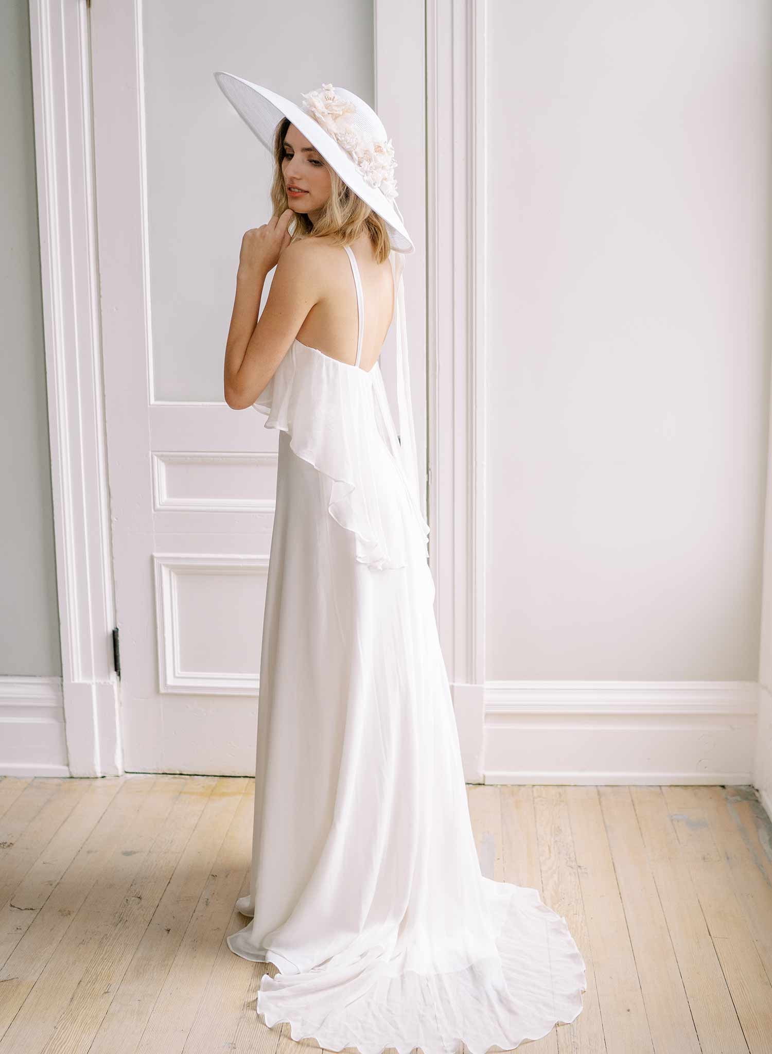 wide white straw hat with silk flowers and bow, twigs and honey