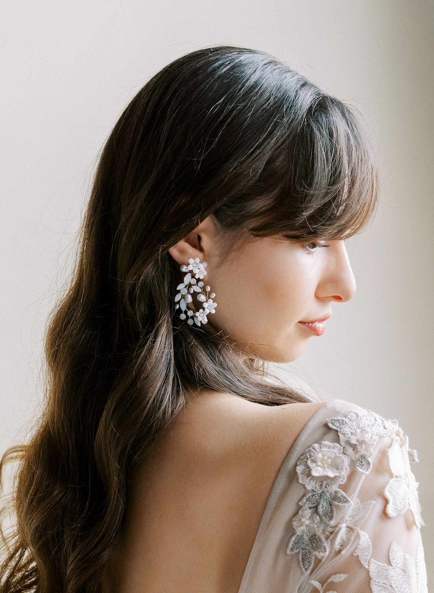 Teardrop shaped bridal and wedding earrings with opal crystals and porcelain flowers. Post backs by Twigs and honey