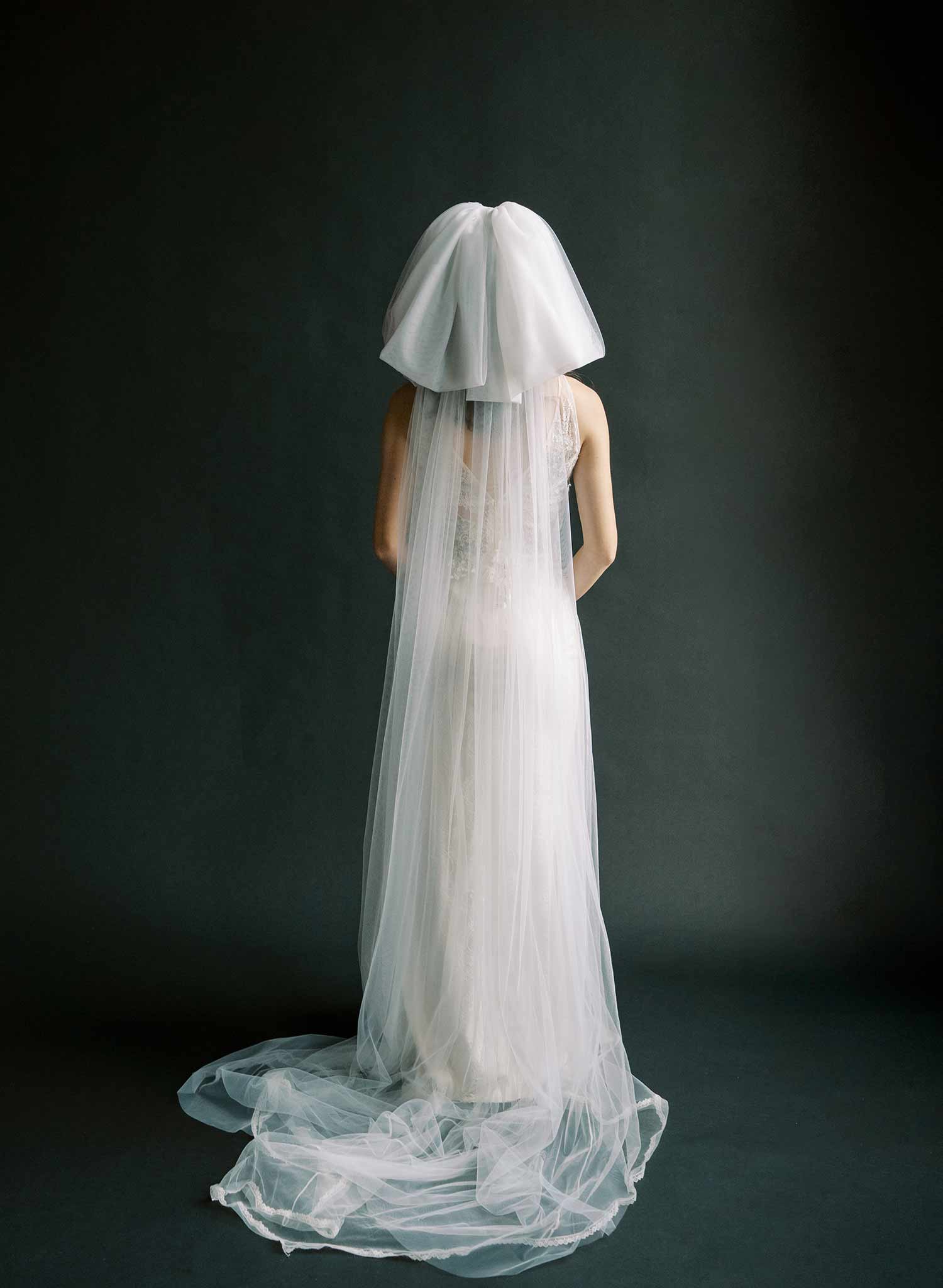 Handmade oversized tulle bow veil with chapel train, wedding and bridal. 