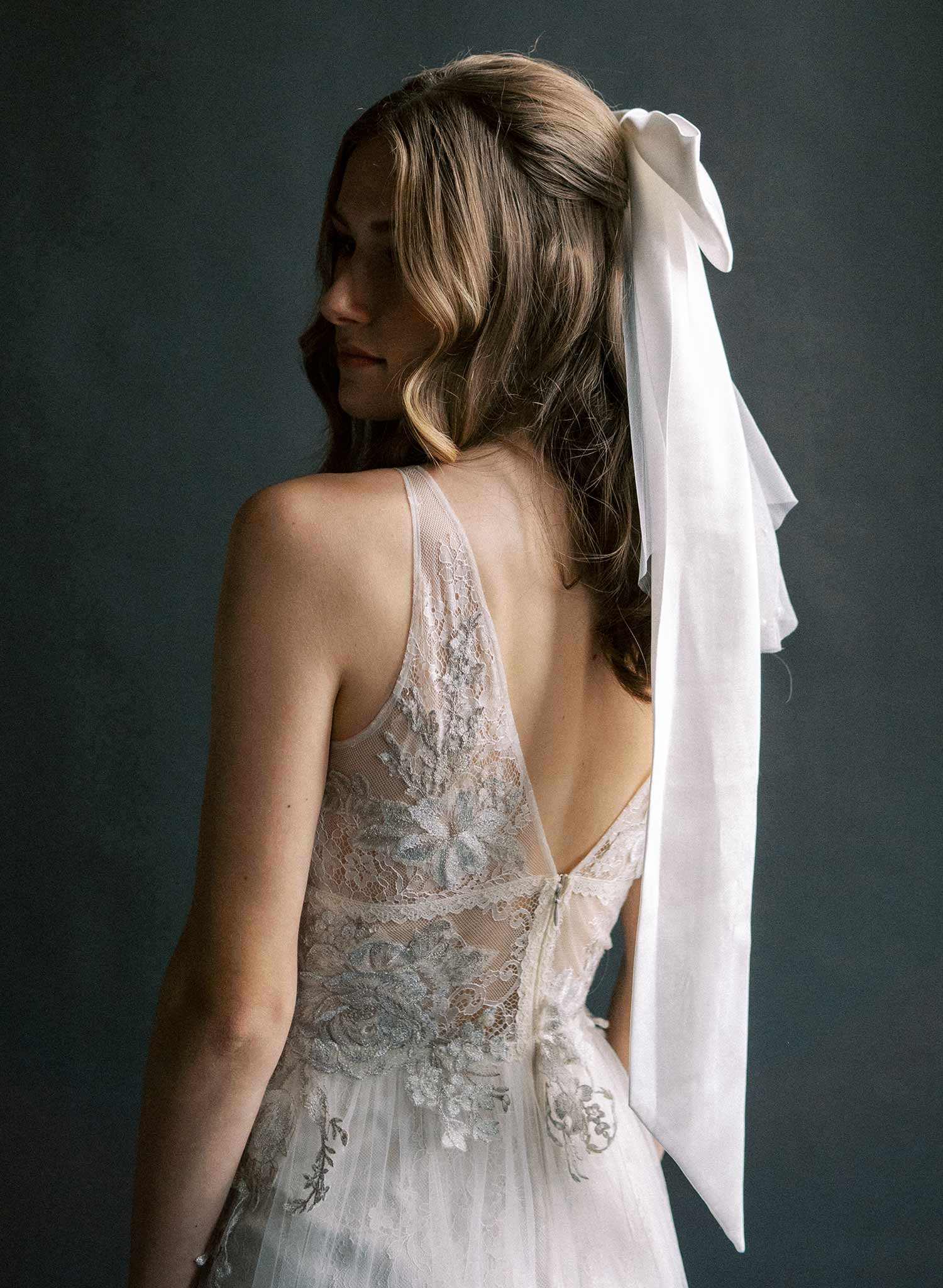 Handmade silk bow with long tails. Bridal bow with attached pearl mini veil.