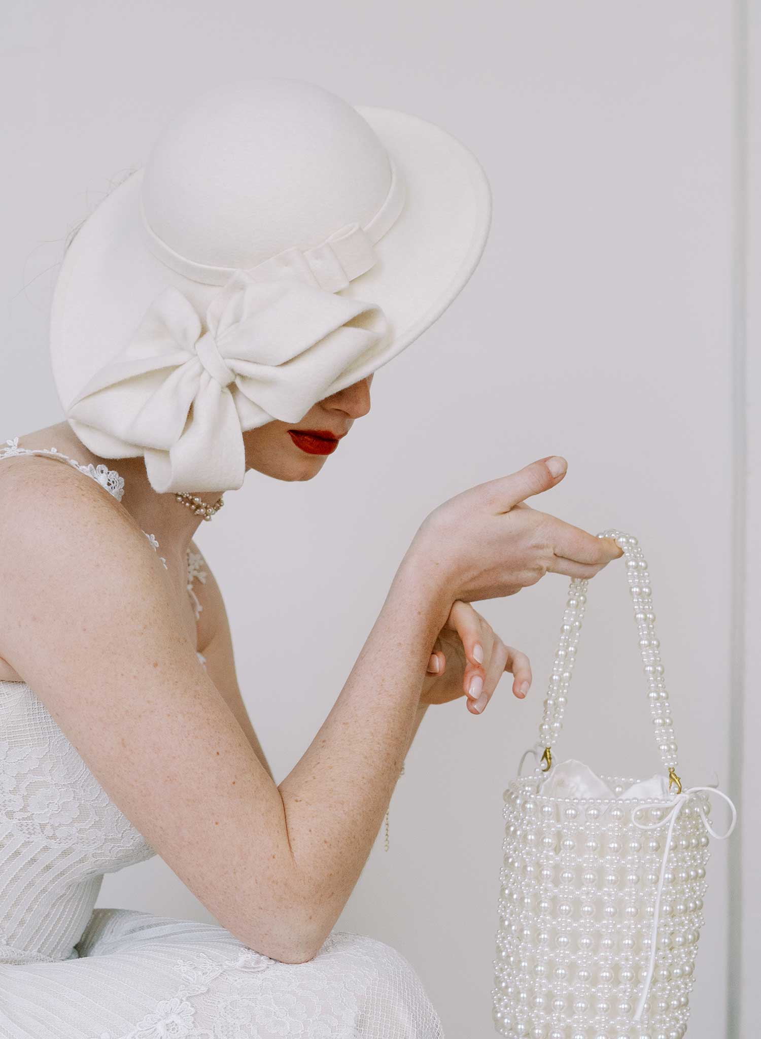 Bridal sloping wool hat with cascading bows - Style #2677