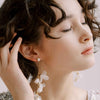 silk and flower bridal earrings by twigs & honey