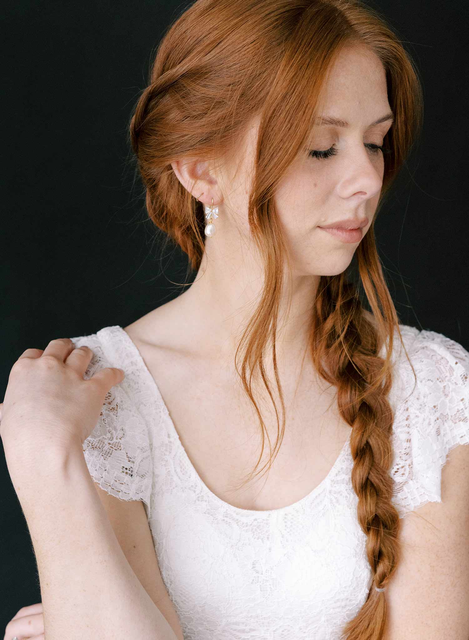 pearl and crystal bow bridal earrings by twigs and honey