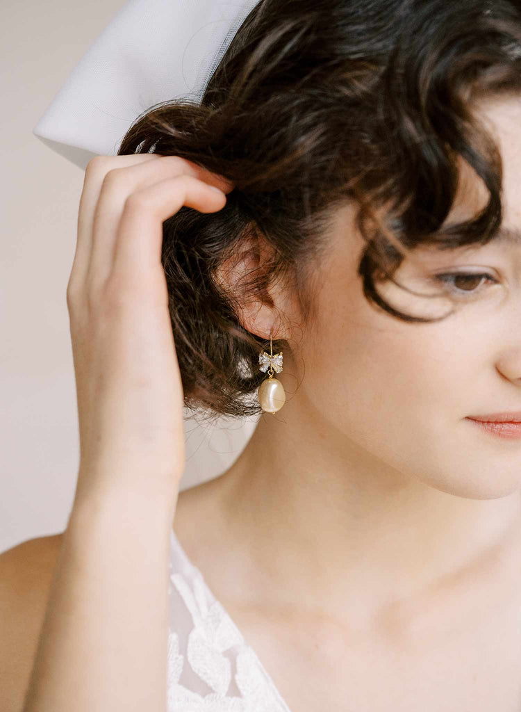 pearl and crystal bow bridal earrings by twigs and honey