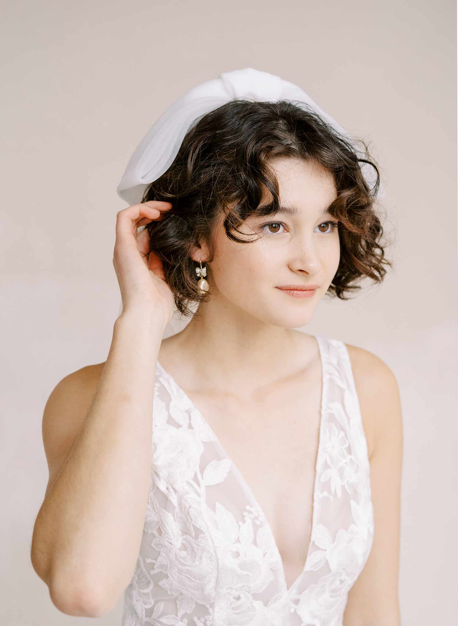 pearl and crystal bow bridal earrings by twigs and honey