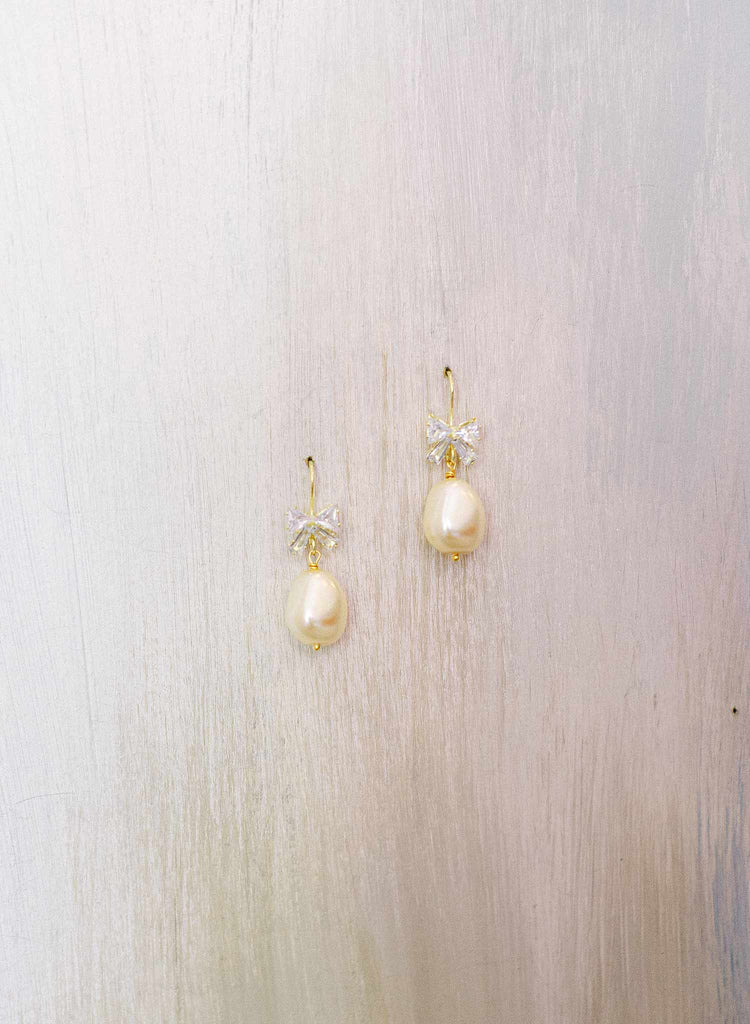 pearl and crystal bow bridal earrings by twigs and honey