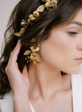 gold colored flower cluser earrings by twigs and honey