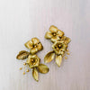 gold colored flower cluser earrings by twigs and honey