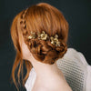 golden colored flower hair pin set by twigs and honey
