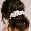 Handmade clay magnolia flower hair comb by twigs and honey