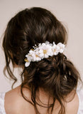 Handmade clay magnolia flower hair comb by twigs and honey