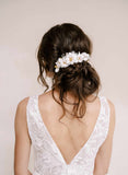 Handmade clay magnolia flower hair comb by twigs and honey