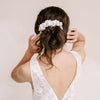 Handmade clay magnolia flower hair comb by twigs and honey