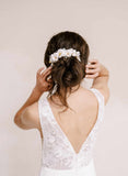 Handmade clay magnolia flower hair comb by twigs and honey