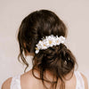 Handmade clay magnolia flower hair comb by twigs and honey