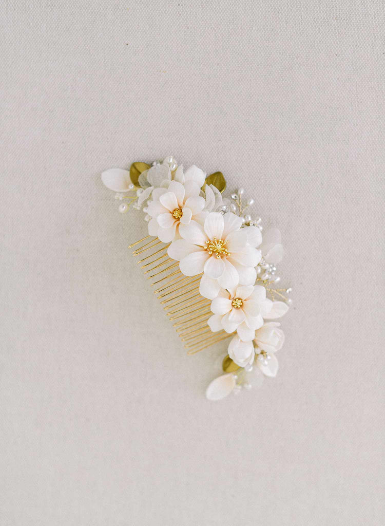 Handmade clay magnolia flower hair comb by twigs and honey