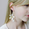gold and magnolia flower with pearl bridal earrings by twigs and honey