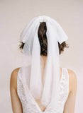 Long and soft tulle bridal hair comb bow by twigs & honey