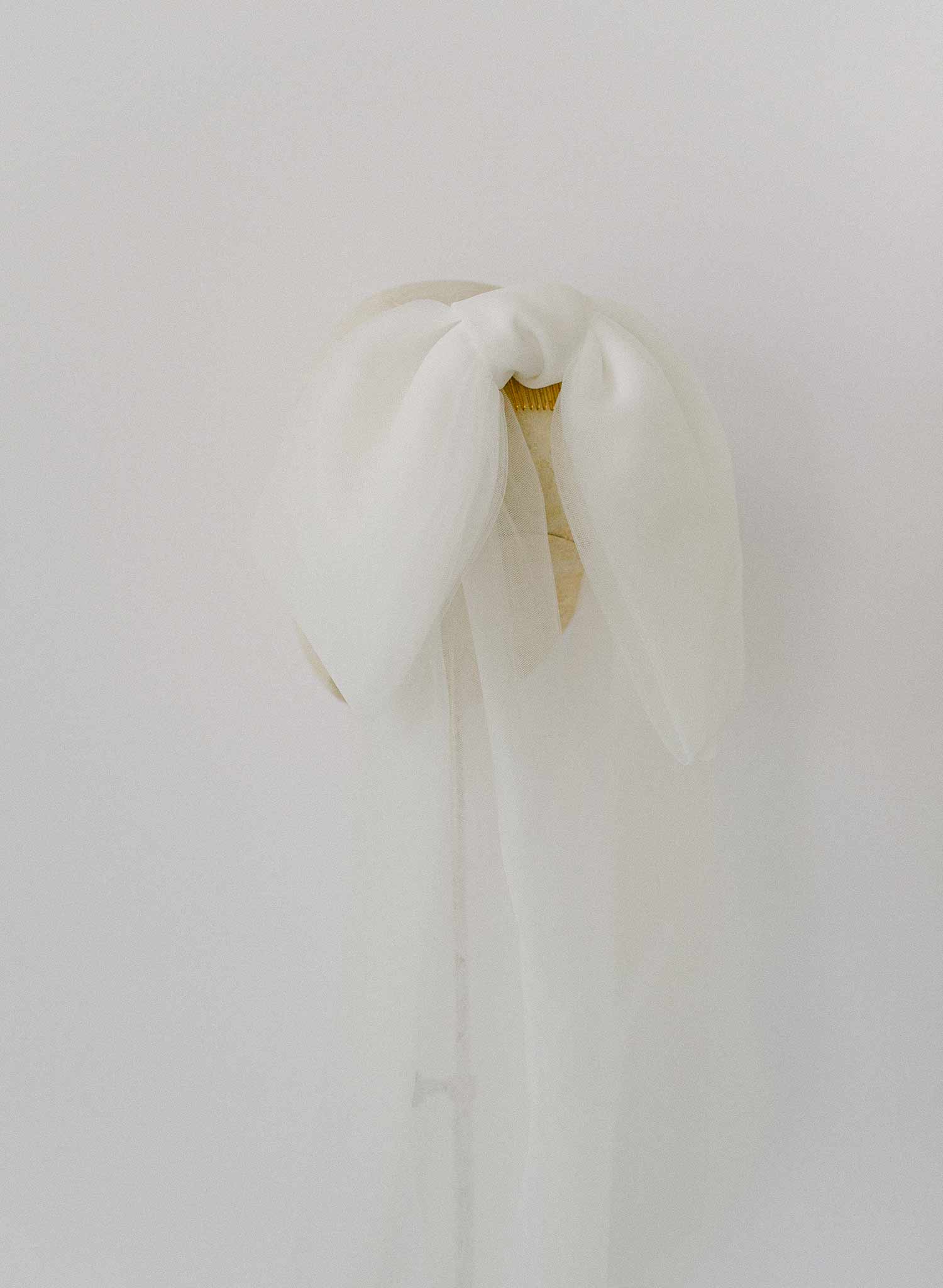 Long and soft tulle bridal hair comb bow by twigs & honey