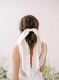 https://www.twigsandhoney.com/cdn/shop/products/2364-silk-long-bridal-hair-bow-accessory-twigsandhoney-e_compact.jpg?v=1671517929