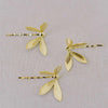 Gold dragonfly hairpins by twigs and honey