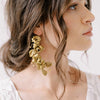 Gold colored bridal earrings by twigs and honey