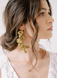 Gold colored bridal earrings by twigs and honey
