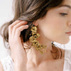 Gold colored bridal earrings by twigs and honey