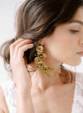 Gold colored bridal earrings by twigs and honey