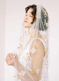 wedding veil with hand sewn embroidery and flowers by twigs & honey