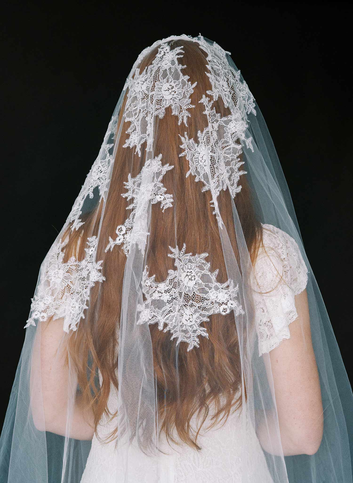 https://www.twigsandhoney.com/cdn/shop/products/2391-floating-beaded-lace-bridal-fingertip-veil-twigsandhoney-d_2048x2048.jpg?v=1671521341