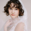 bridal veil with floating lace by twigs and honey