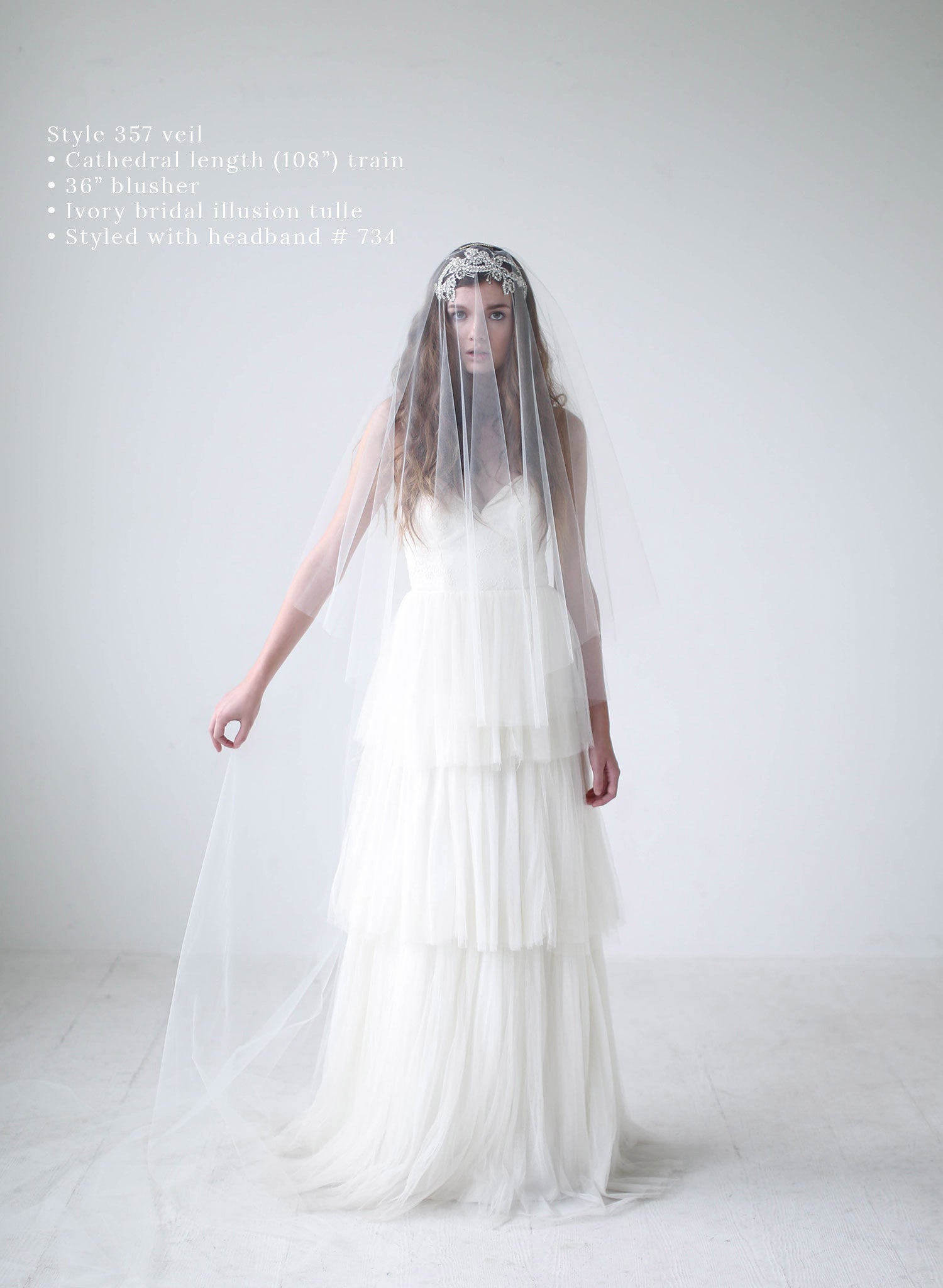 https://www.twigsandhoney.com/cdn/shop/products/357_new1-cathedral-wedding-veil-with-blusher_2048x2048.jpg?v=1481312961