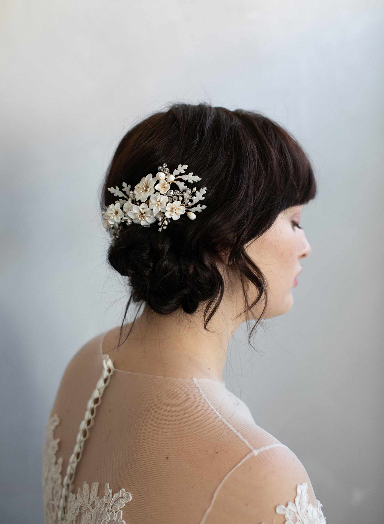 https://www.twigsandhoney.com/cdn/shop/products/940-bridal-blossomandflower-hair-comb-ivory-headpiece-twigsandhoney_0005_2048x2048.jpg?v=1544665624